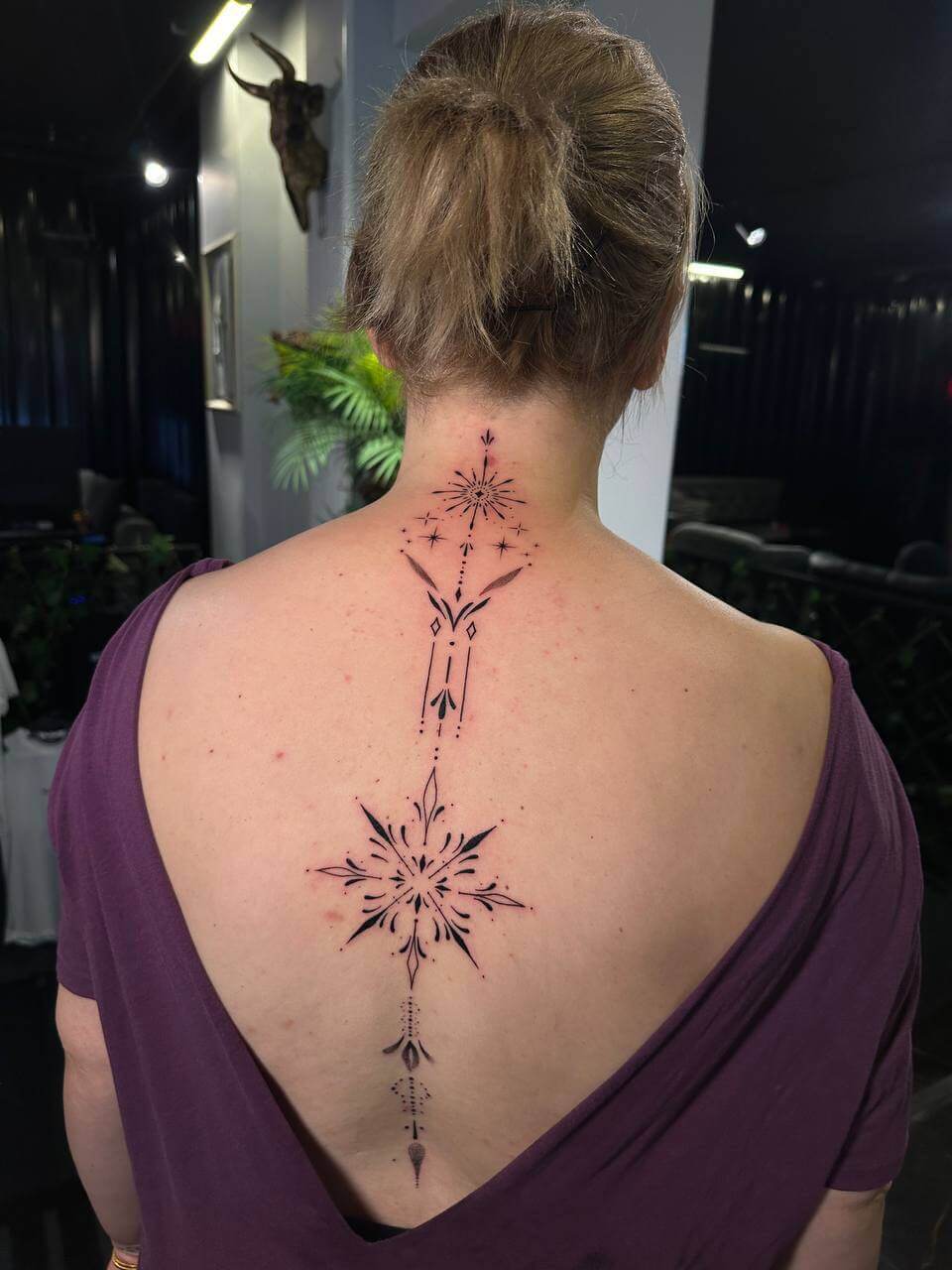 Istanbul women geometric spine star tattoo &ndash; Bosphorus Ink