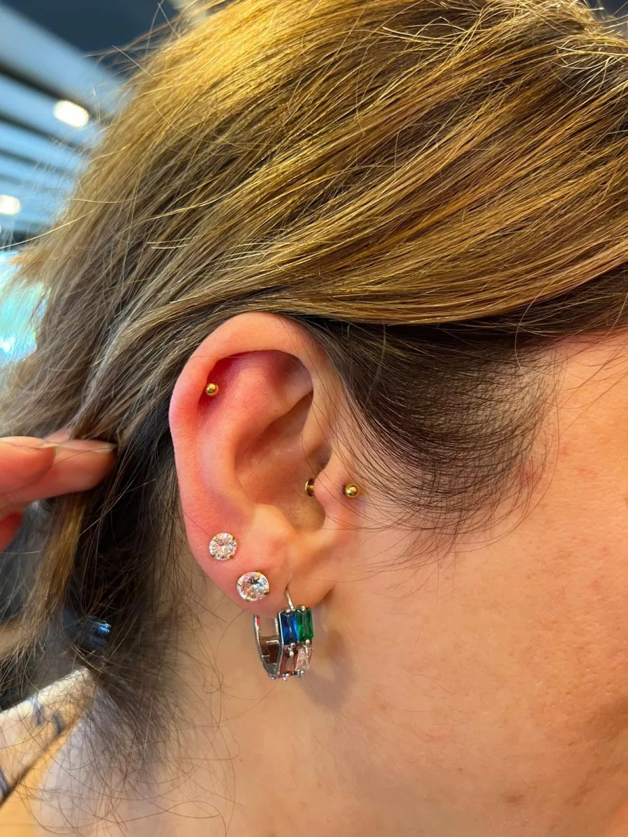 Helix and tragus piercing by Buse, Bosphorus Ink Istanbul