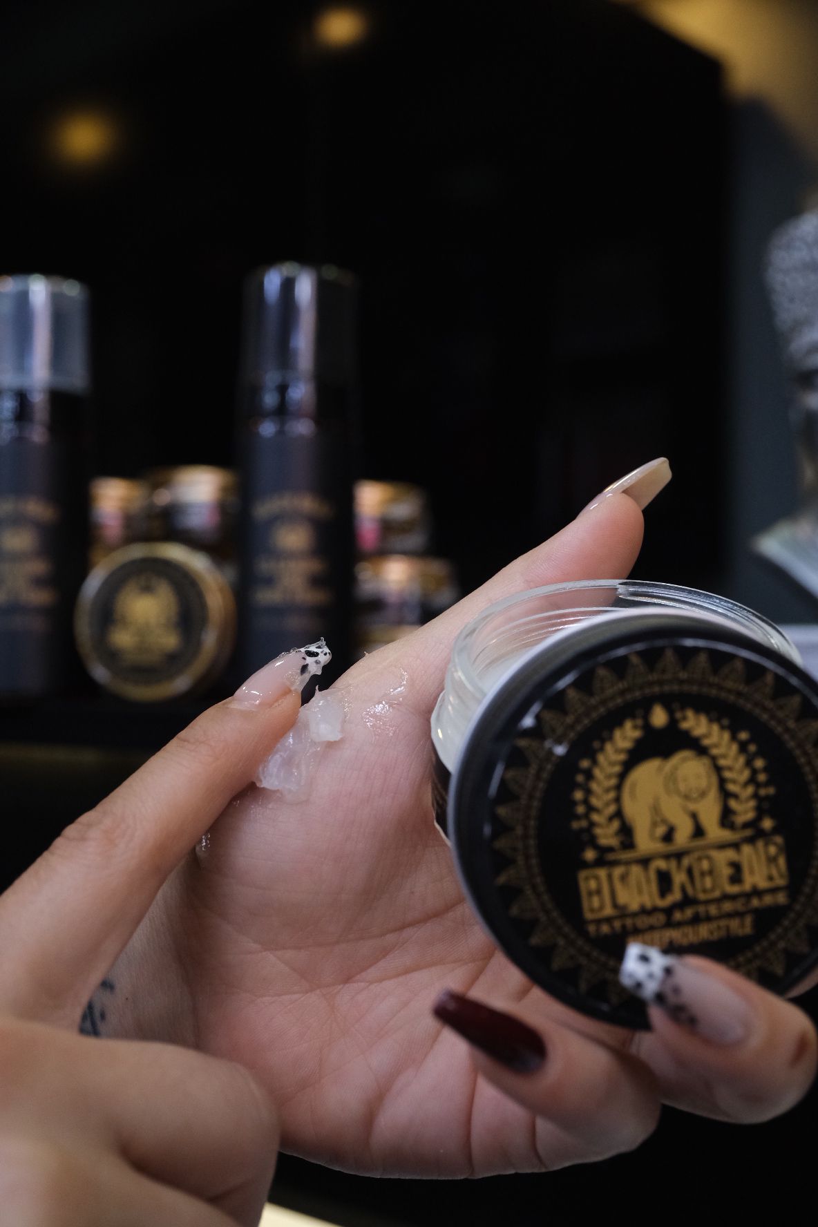 Applying tattoo aftercare cream &mdash; BlackBear moisturiser for new tattoo healing