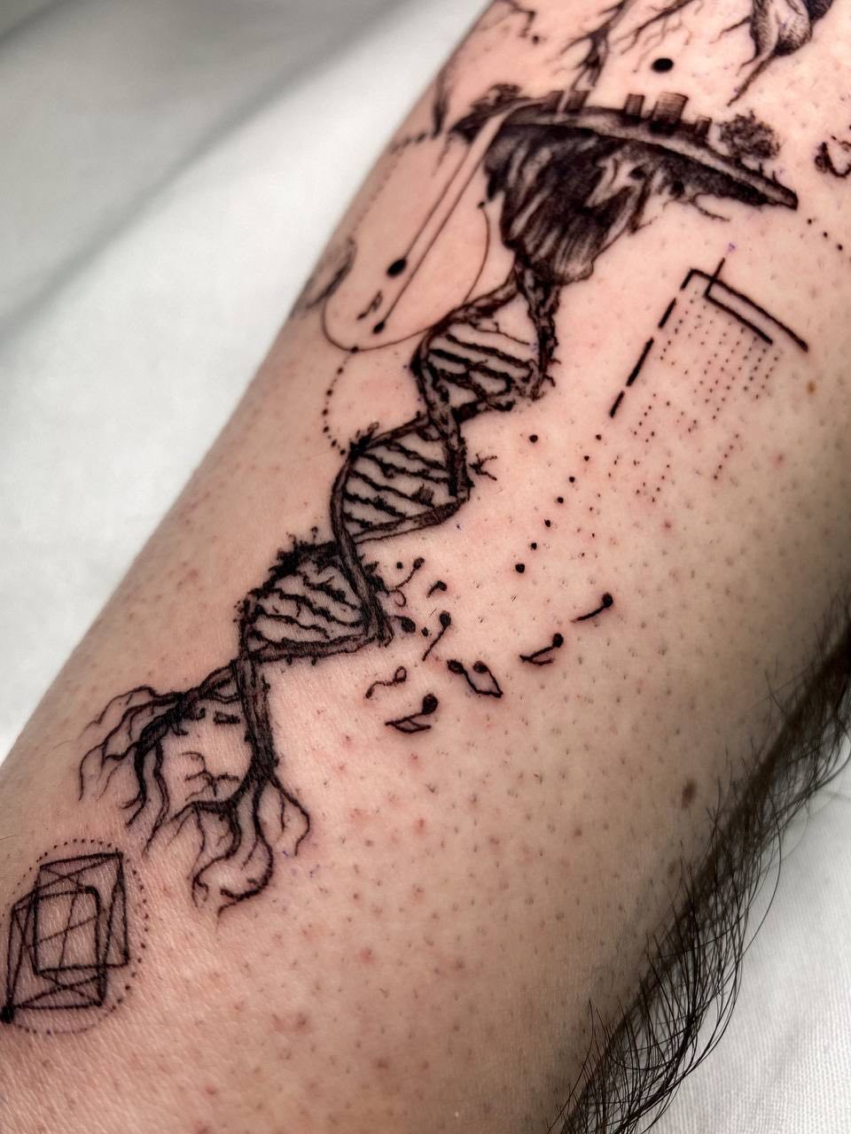 DNA Helix and Geometric Shapes Arm Tattoo | Istanbul