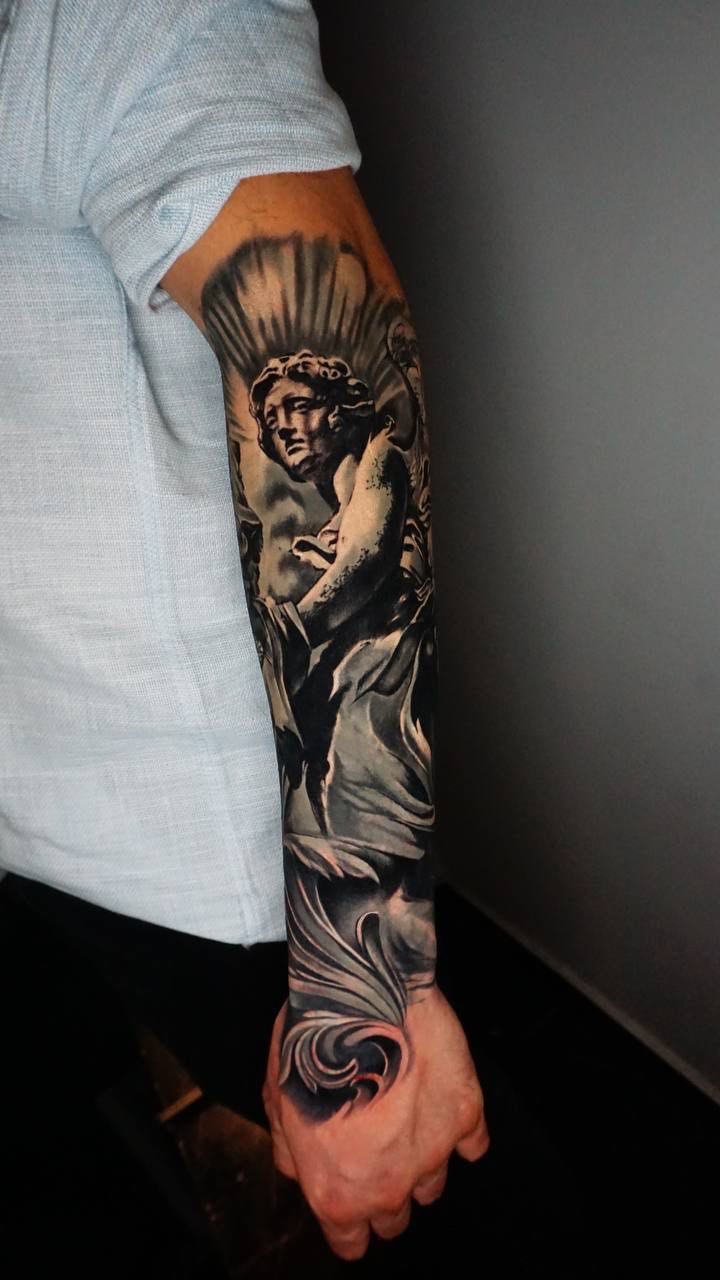 Realistic Zeus Statue Sleeve Tattoo