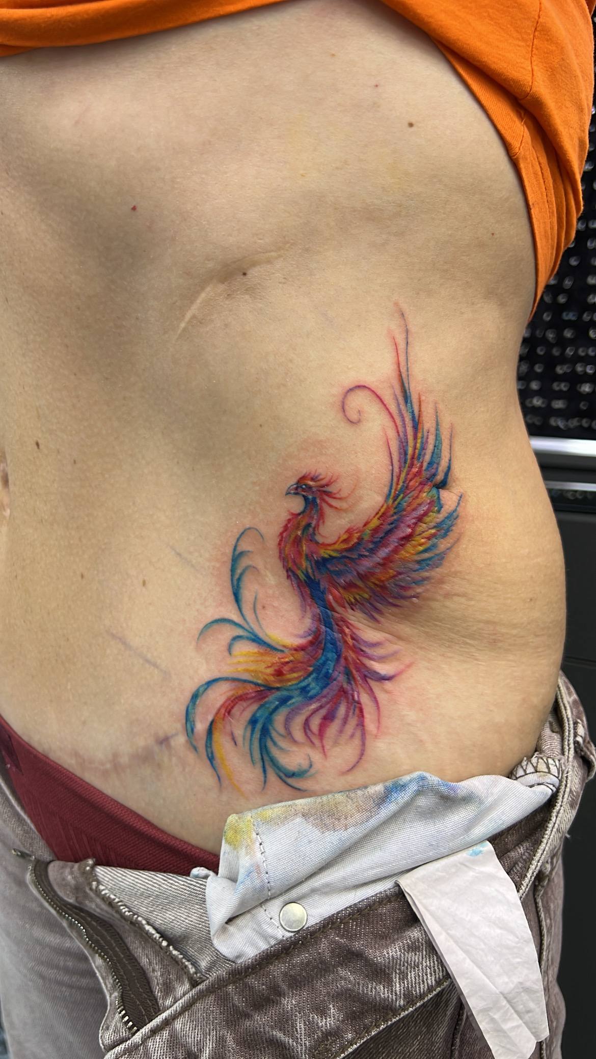 Colorful Phoenix Rib Tattoo | Istanbul